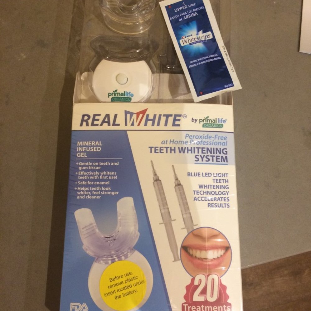 brand new in box teeth whitening light/tray +white strips